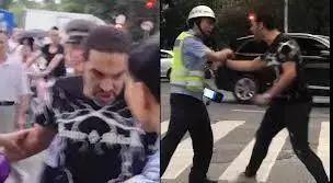 privilege? foreigner attacks a policeman in china!