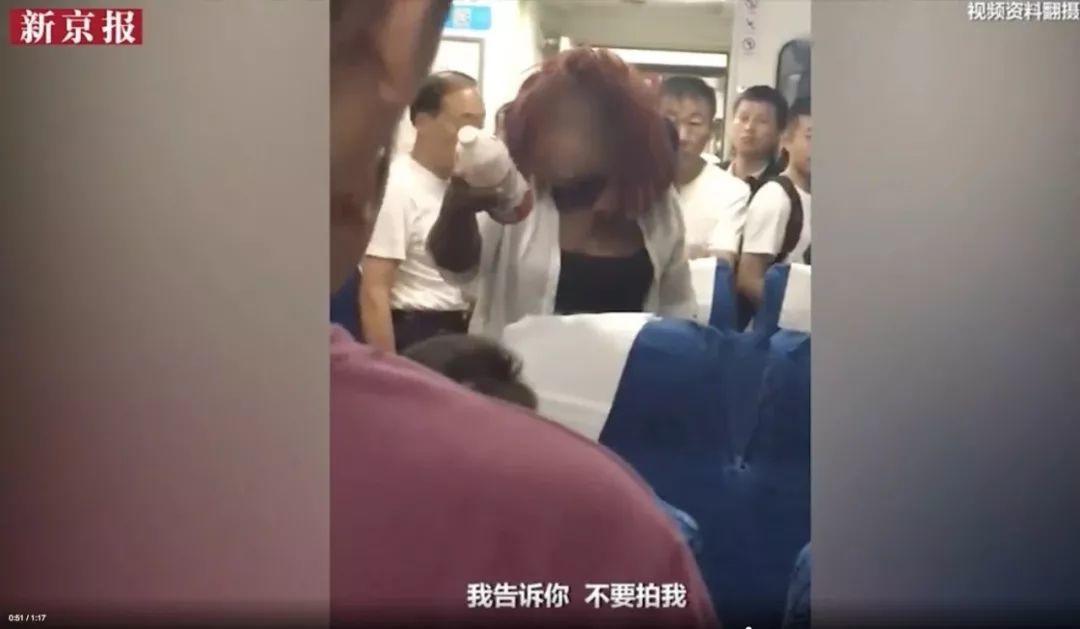 foreign woman stole seat on train & threw water at others!