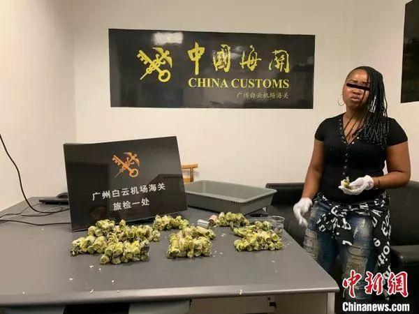 african woman seized for her local food when entering china!?